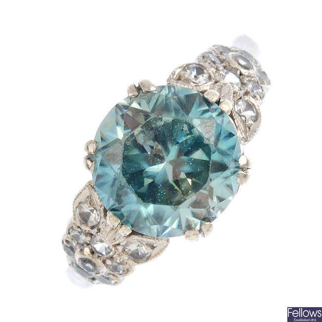 A zircon and gem-set dress ring.