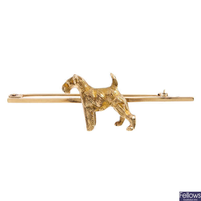 A mid 20th century 9ct gold dog brooch.