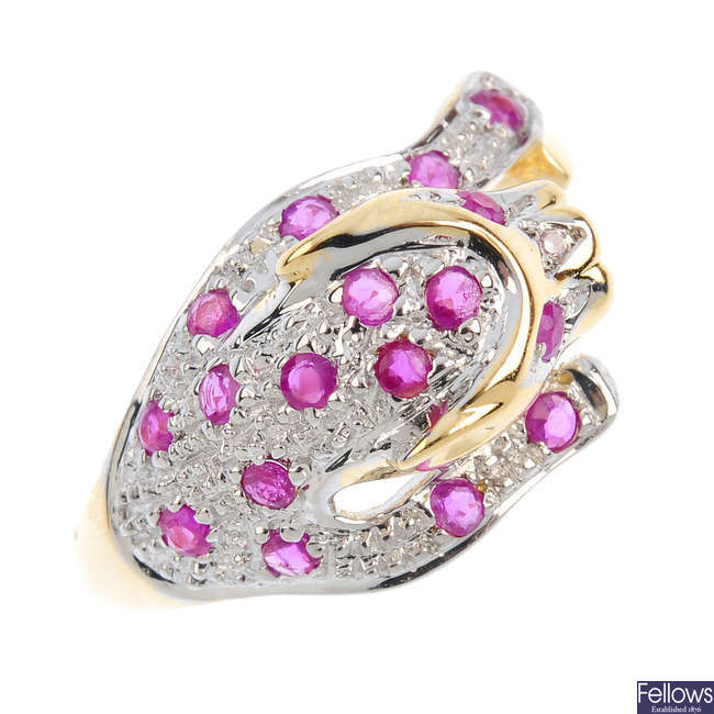 A ruby leopard ring.