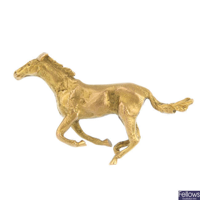 A 9ct gold horse brooch, by Albaster & Wilson.