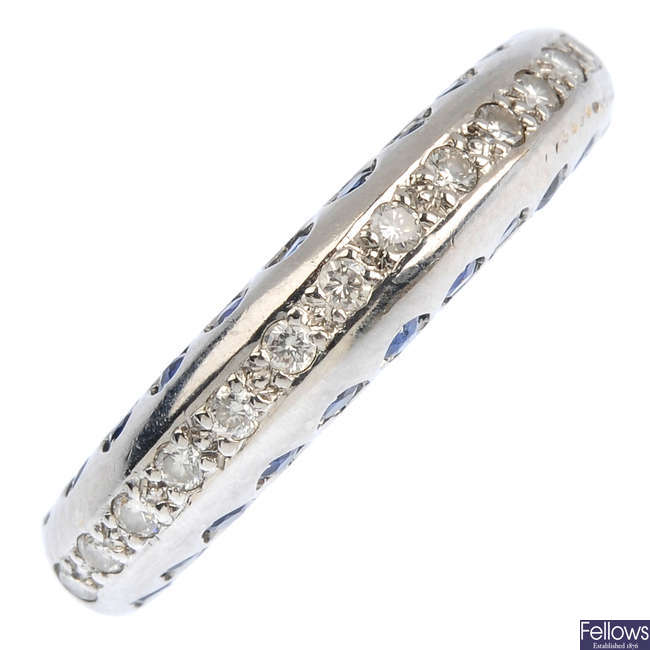 An 18ct gold diamond and sapphire band ring.