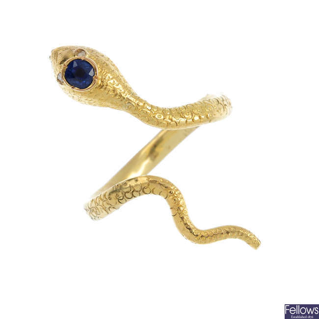A gem-set snake ring.