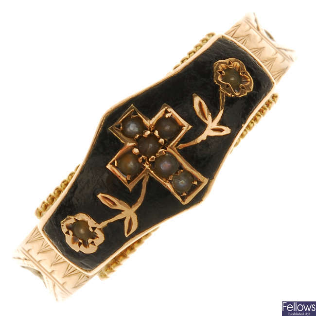 An early 20th century 9ct gold enamel and split pearl memorial ring.