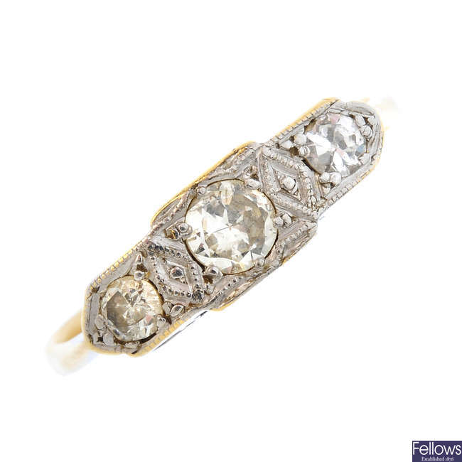 A mid 20th century 18ct gold and platinum diamond three-stone ring.