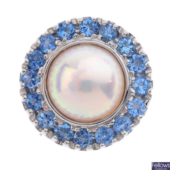 A platinum mabe pearl and aquamarine cluster ring.  