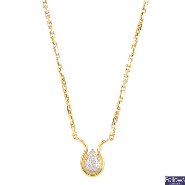 An 18ct gold diamond single-stone pendant.