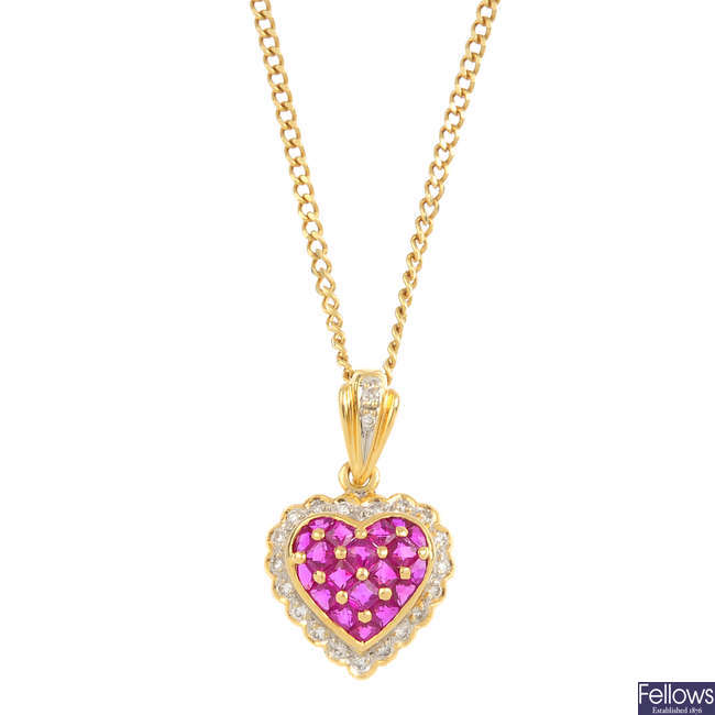 A ruby and diamond pendant, with an 18ct gold chain.
