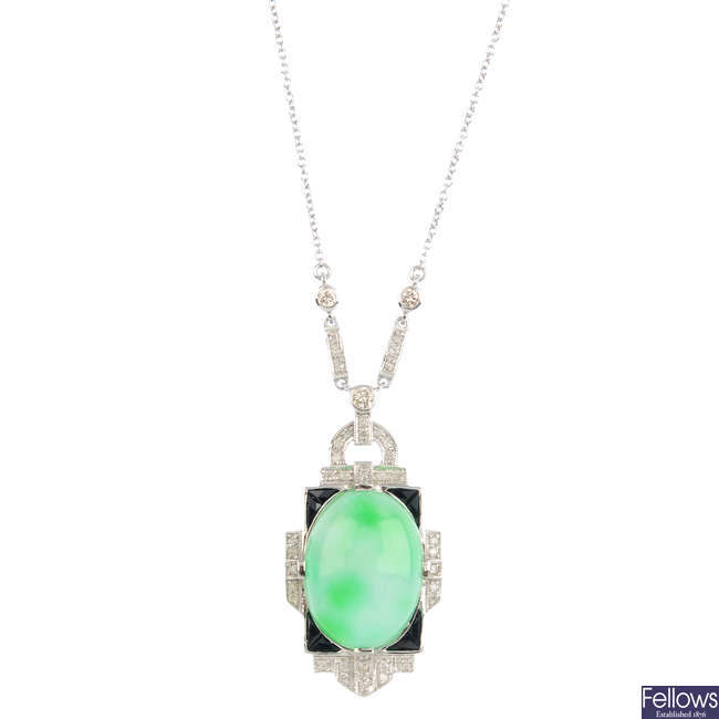 A jade, onyx and diamond necklace. 