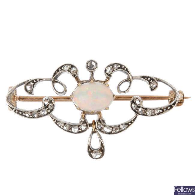 A late Victorian silver and gold opal and diamond brooch.