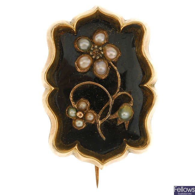 A late Victorian forget-me-not enamel and split pearl brooch.
