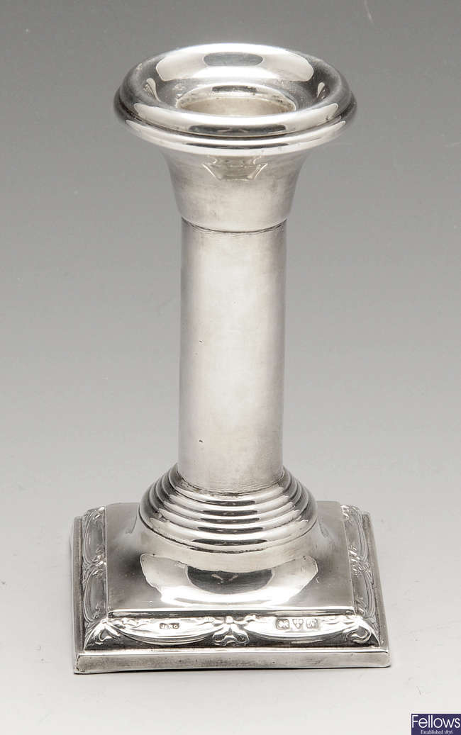 An early twentieth century silver mounted candlestick.
