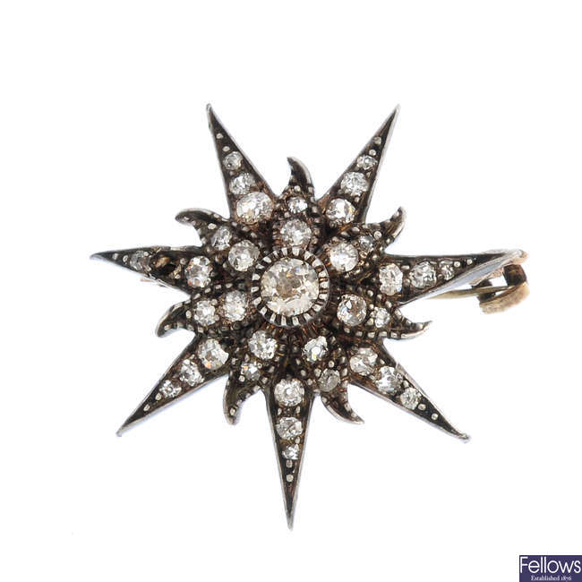 An early 20th century diamond star brooch.
