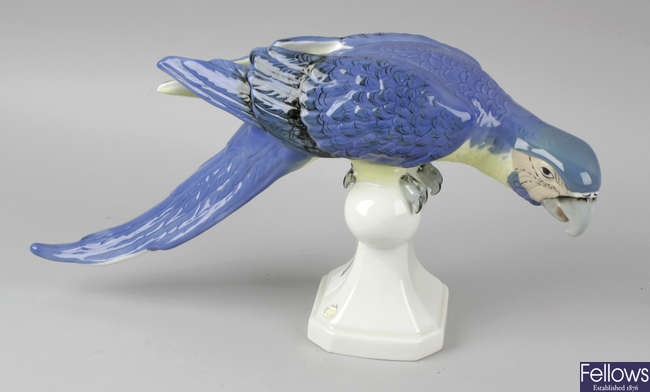 A Royal Dux porcelain figurine modelled as a parrot.