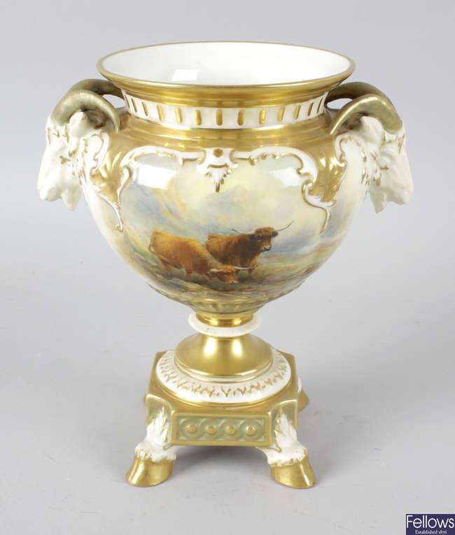 A Royal Worcester bone china vase by John Stinton.