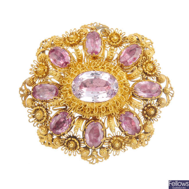An early 19th century gold foil-back topaz cannetille brooch, circa 1830.