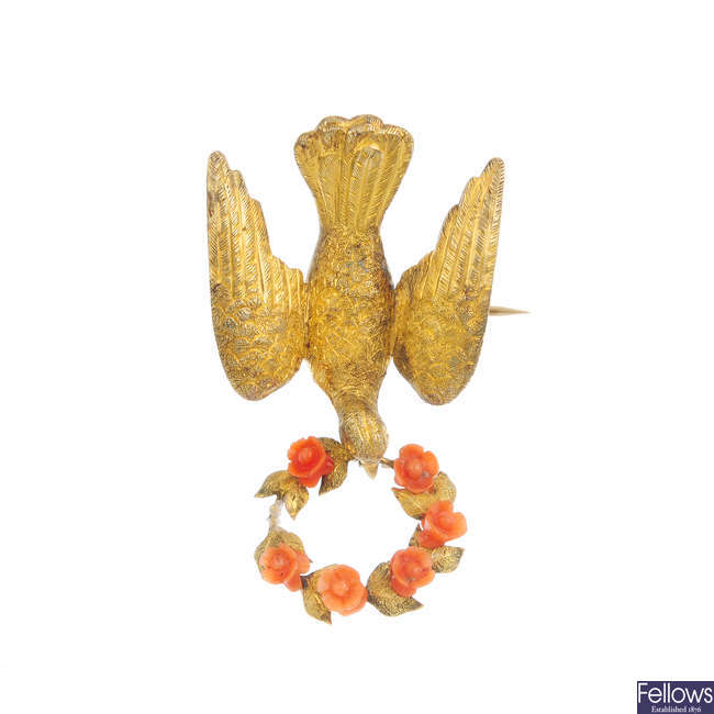 An early 19th century gold coral wreath and dove brooch.