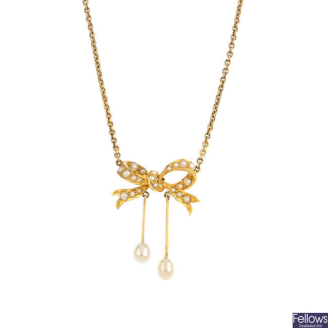 An early 20th century 15ct gold split and cultured pearl pendant, on chain.