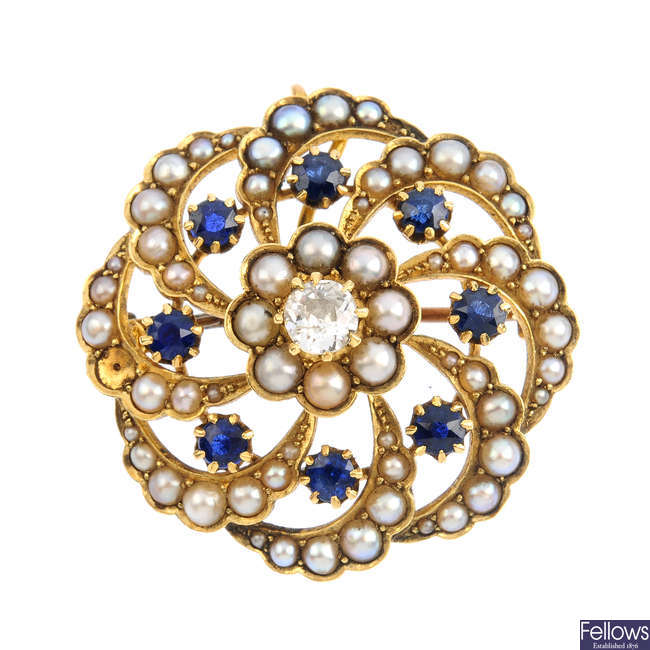 A late Victorian gold diamond and gem-set brooch.
