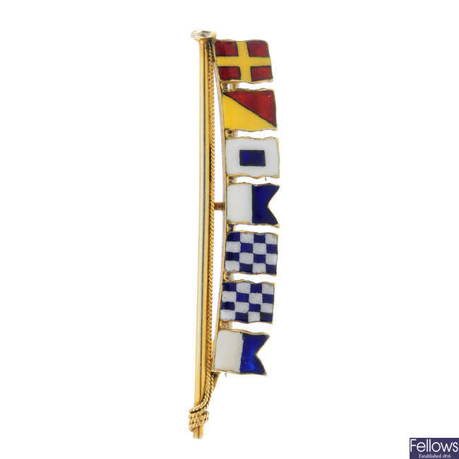 An early 20th century 9ct gold enamel signal flags brooch.