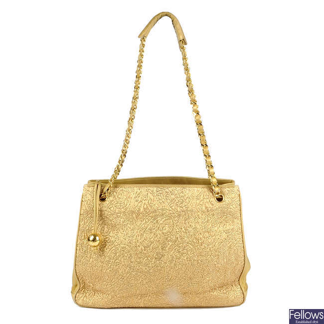 CHANEL - an early 90s gold lamé handbag.