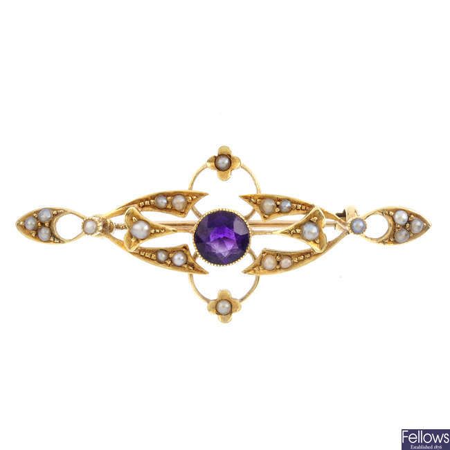 An early 20th century 15ct gold amethyst and split pearl brooch.