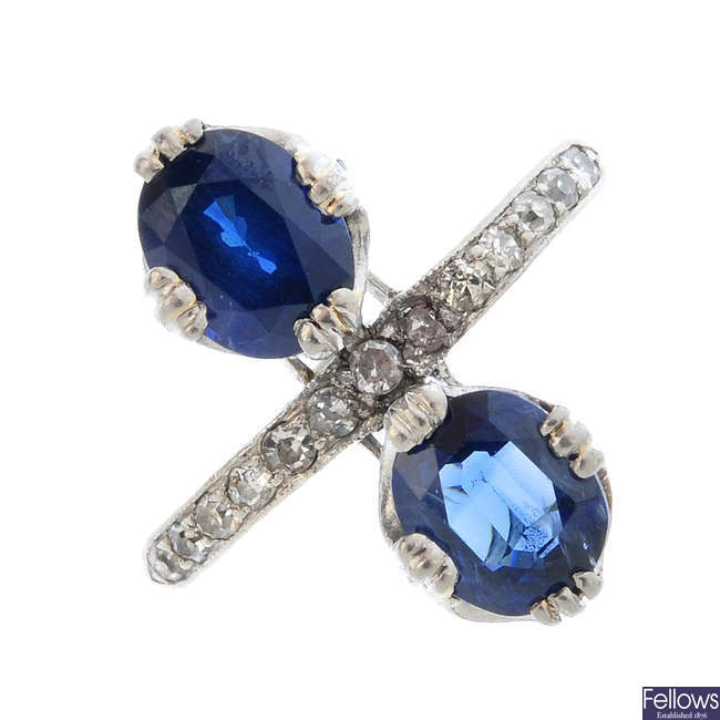 A mid 20th century sapphire and diamond dress ring.