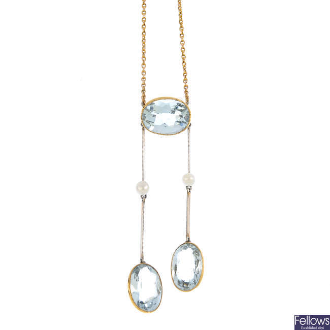 An early 20th century aquamarine and seed pearl negligee necklace, with matching earrings.