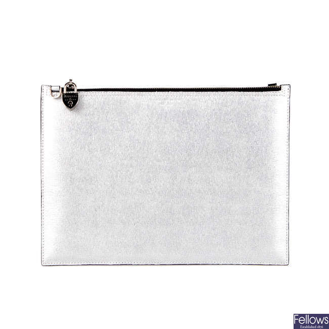 ASPINAL OF LONDON - a flat Soho double sided clutch.
