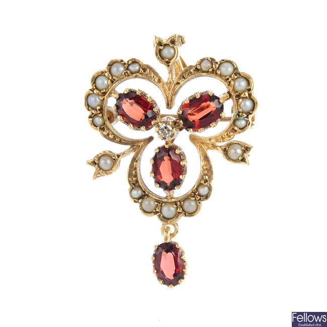 A 9ct gold diamond and gem-set pendant.