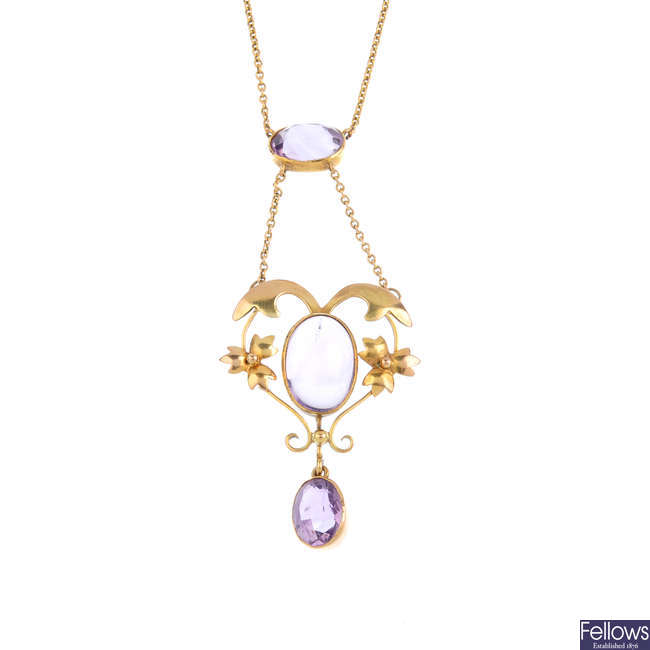 An early 20th century gold amethyst necklace.