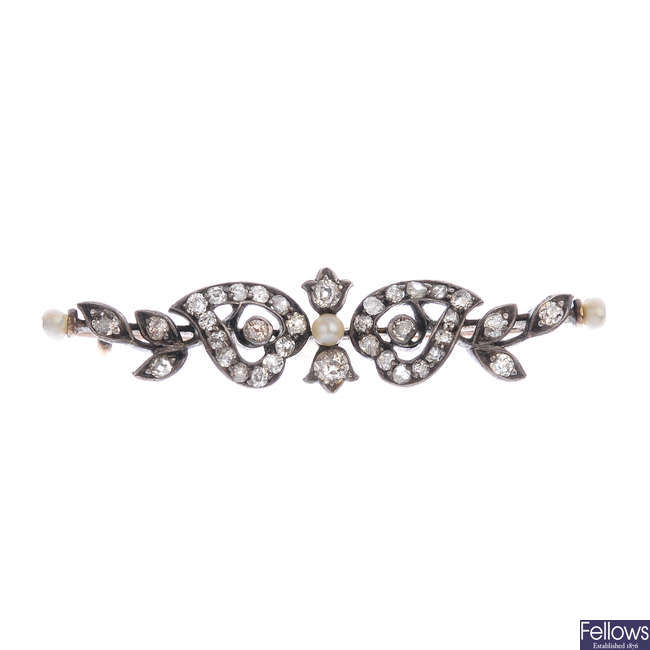 A late Victorian silver and gold diamond and seed pearl bar brooch.