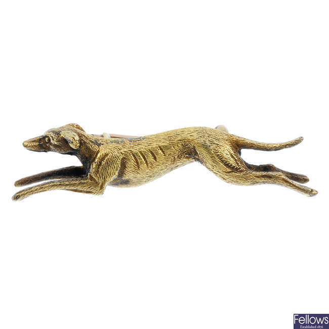 A greyhound brooch.