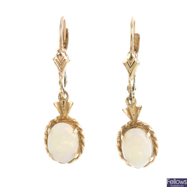 A pair of opal earrings.