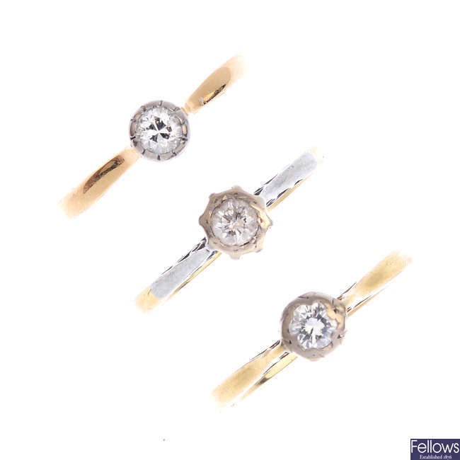 Three gold diamond single-stone rings.