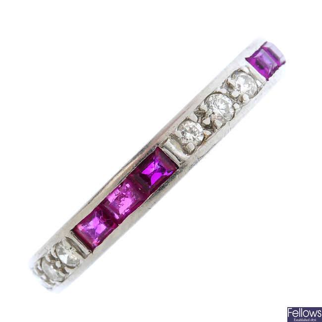 A diamond and ruby full eternity ring.