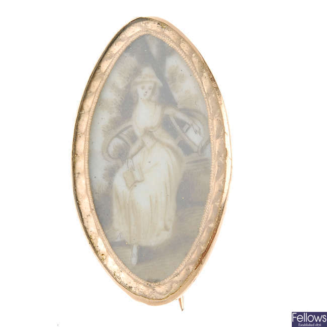 An early Victorian gold memorial brooch.