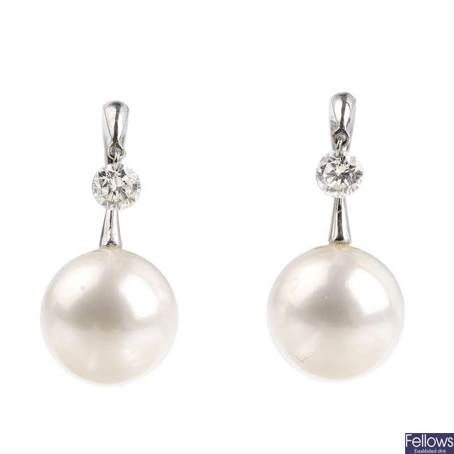 A pair of 18ct gold cultured pearl and diamond earrings.
