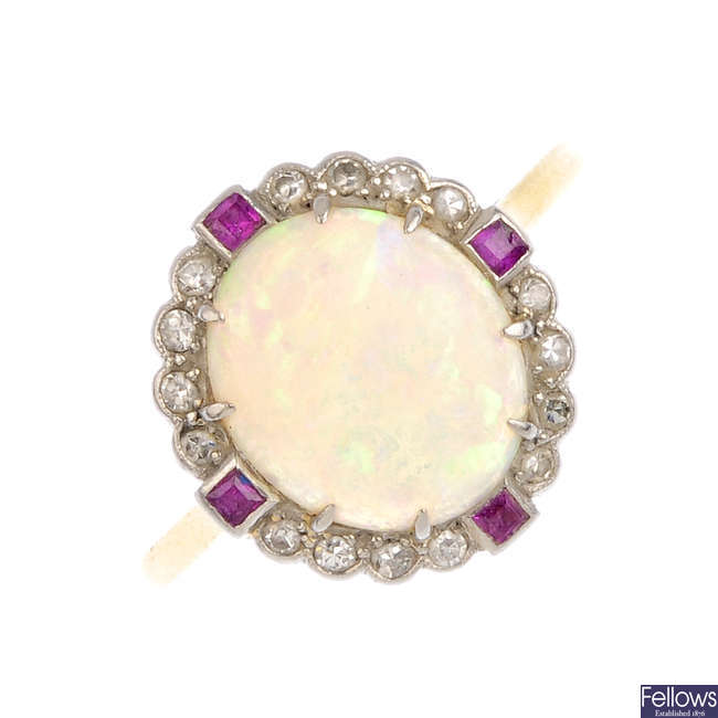 An early 20th century opal and diamond cluster ring.
