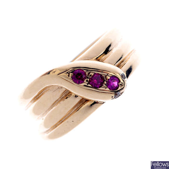 A 9ct gold synthetic ruby snake ring.
