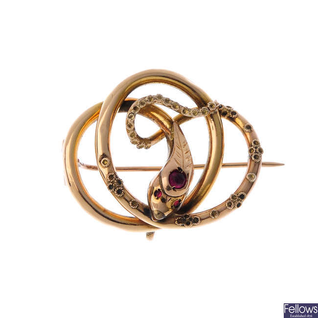 A late Victorian gold ruby snake brooch.