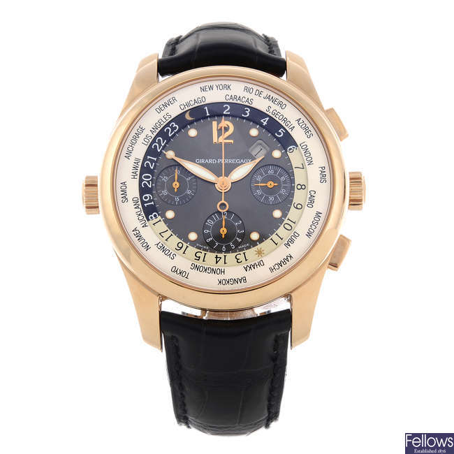 GIRARD-PERREGAUX - a gentleman's rose metal World Time chronograph wrist watch.