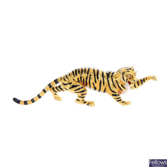 An 18ct gold diamond and enamel tiger brooch.