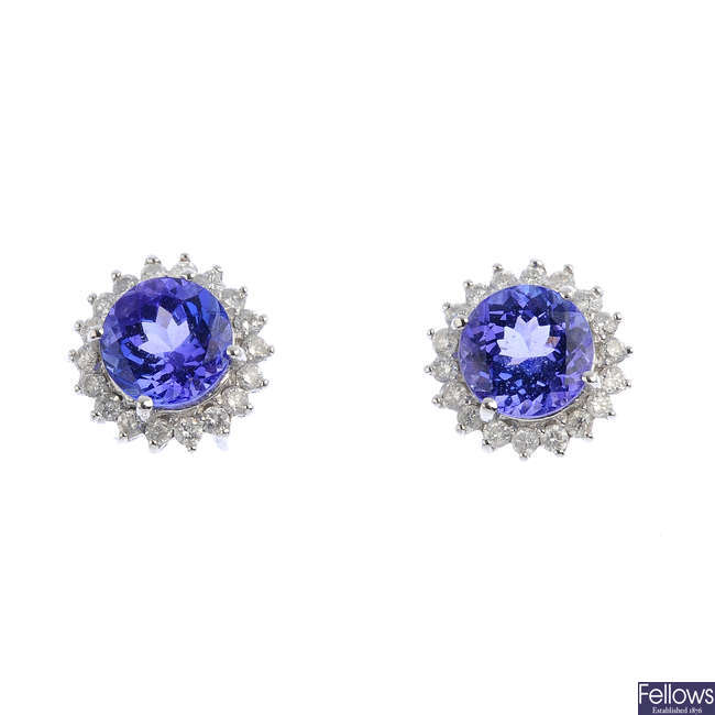 A pair of tanzanite and diamond cluster earrings.