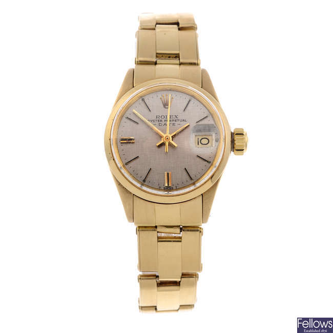 ROLEX - a lady's 18ct yellow gold Oyster Perpetual Date bracelet watch.