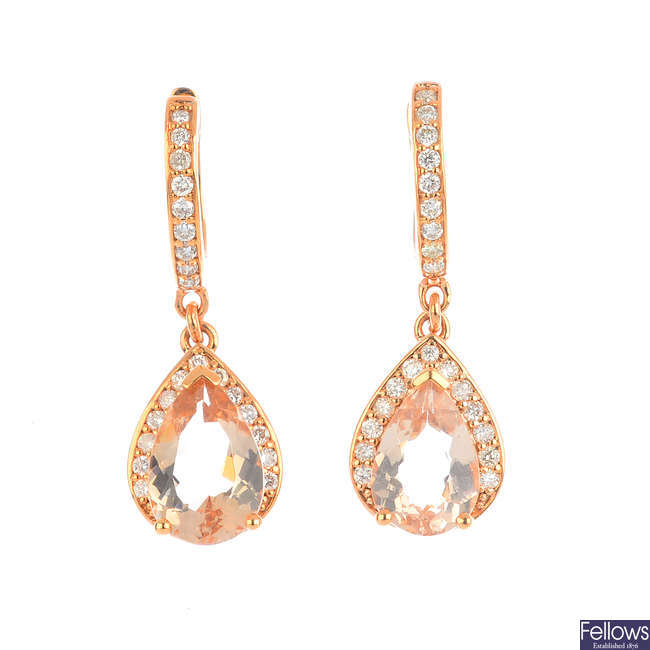 A pair of morganite and diamond earrings.