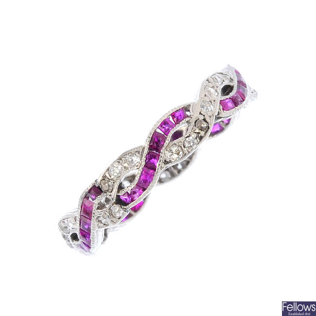 A ruby and diamond full eternity ring.