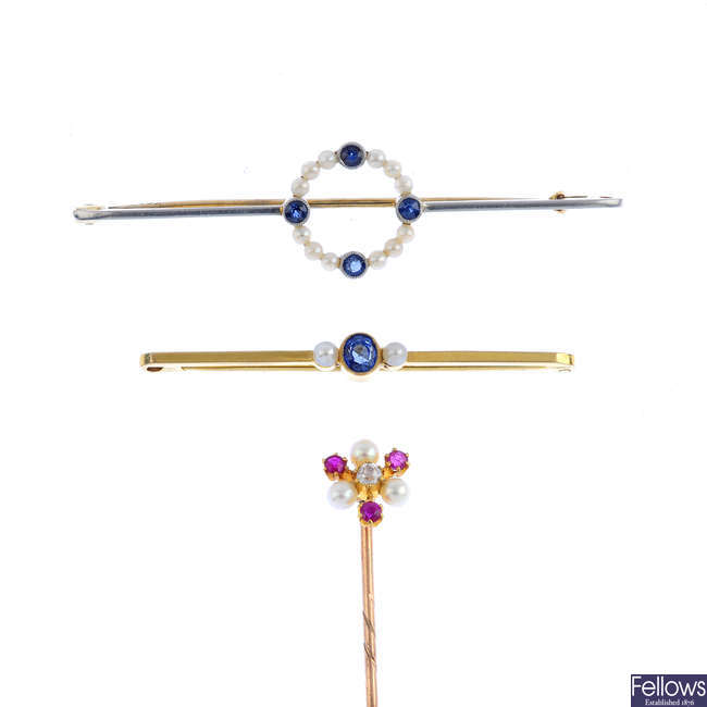 Two early 20th century split pearl and sapphire bar brooches and a gem-set stickpin.