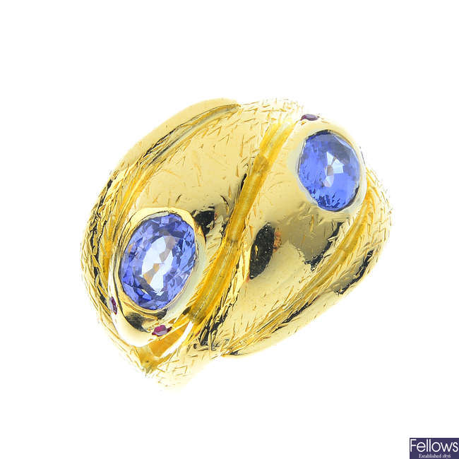 A 1970s 18ct gold sapphire and ruby snake ring.