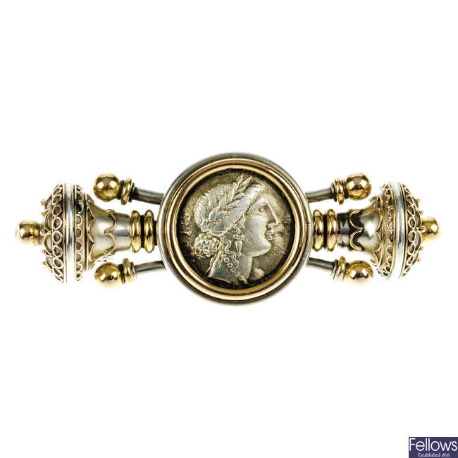 An Etruscan gold and silver brooch.