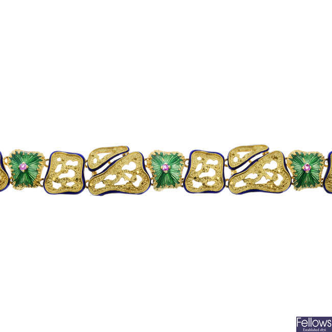 A mid 20th century ruby and enamel bracelet.